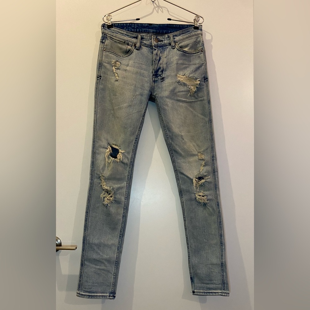 Slim fit distressed KSUBI stretch denim